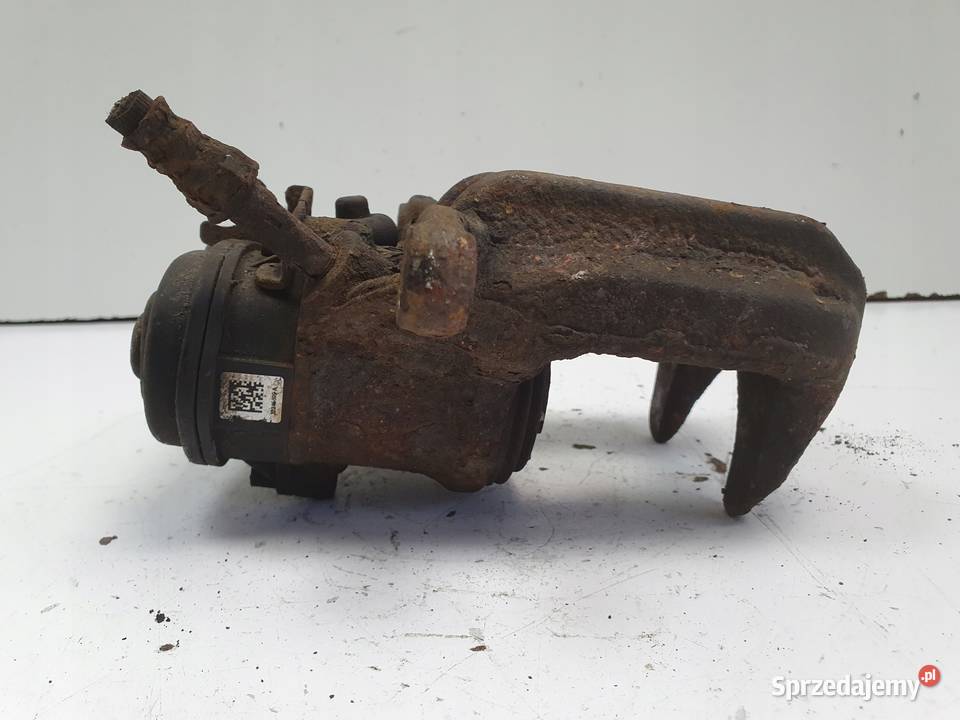 BMW X3 F25 TYLNY ZACISK HAMULCOWY lewy tył