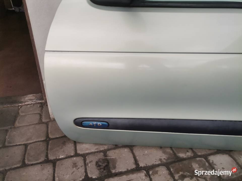 DRZWI LEWY PRZÓD RENAULT MEGANE 1 FL HB MV931 Rok produkcji 2002 Nowy Sącz