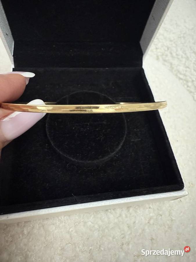 Złota bransoletka koło Bażyny