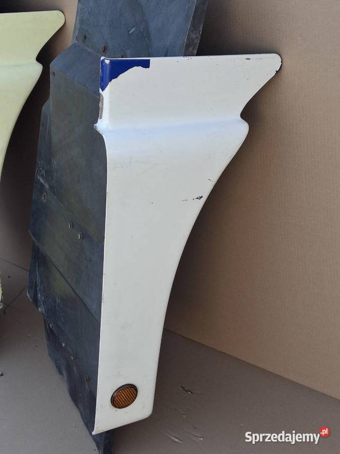 MAN TGA TGX BŁOTNIK KOŁO PRZÓD PRAWY LISTWA Bieleń