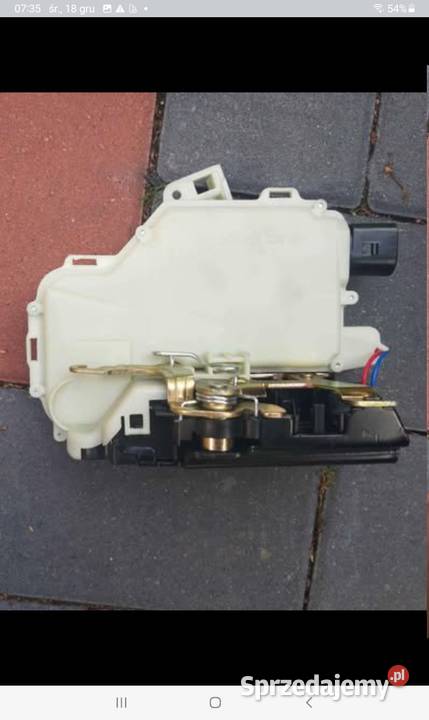 Zamek drzwi VW Golf V