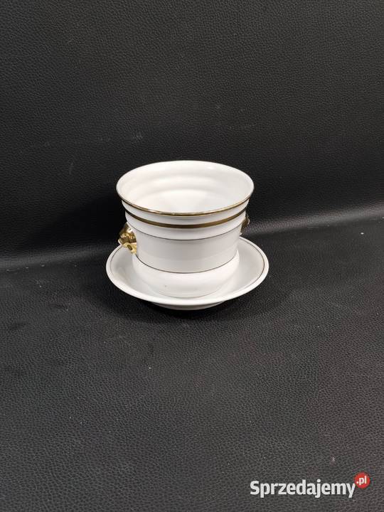 Porcelanowa doniczka osłonka z lwiemi głowami