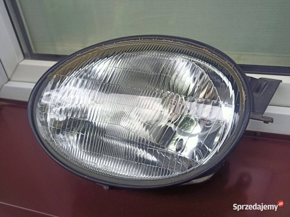 Toyota Corolla E11 lampa przednia lewa reflektor osobowe Lampy przednie Sieradz