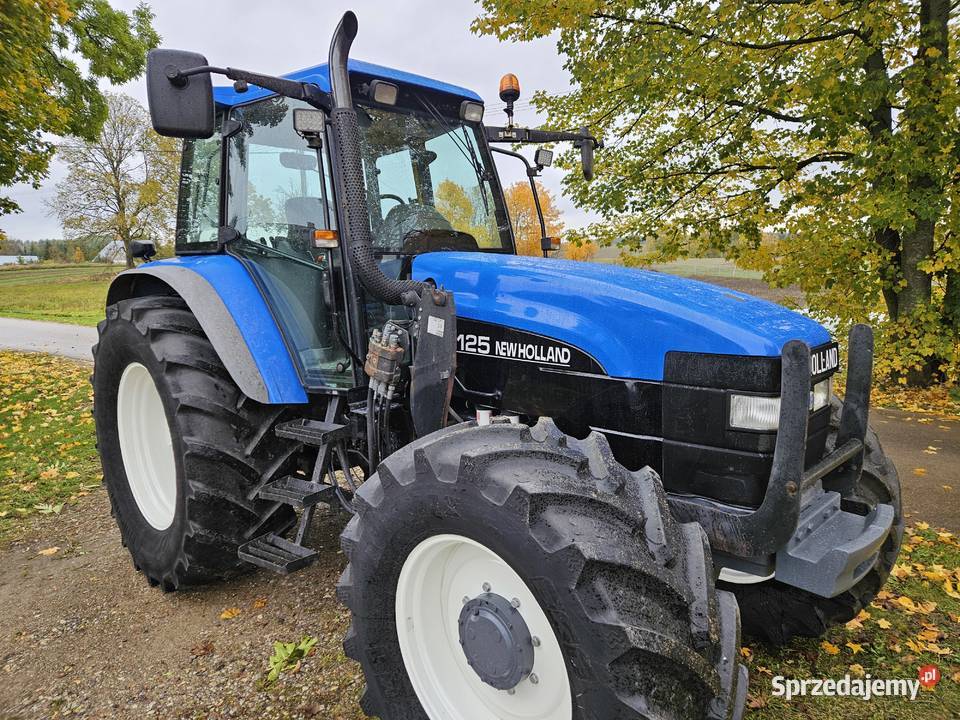 Ciągnik holland tm 125 tm ts podlaskie Sejny sprzedam