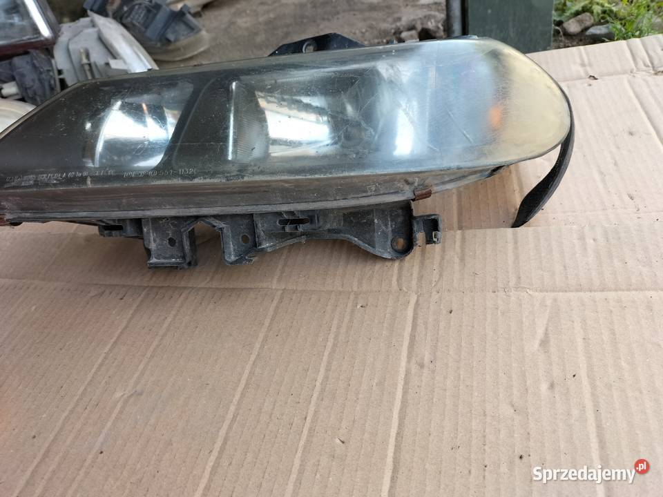 LAGUNA 1 LAMPA PRZÓD LEWA osobowe lubelskie Kamień-Kolonia