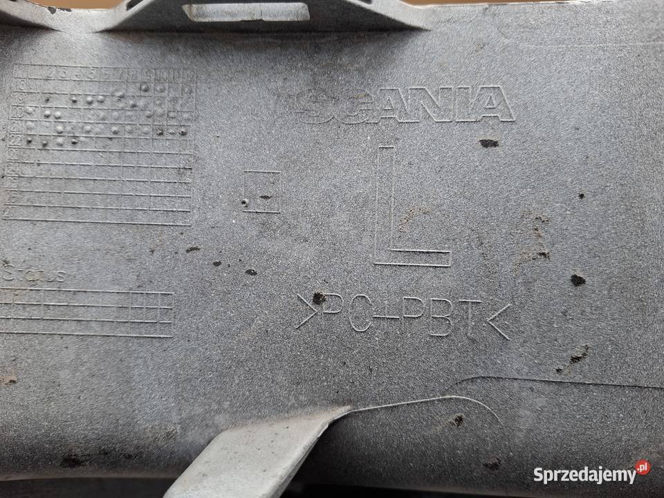 SCANIA R S OKULAR REFLEKTORA LEWY RAMKA LEWA Bieleń