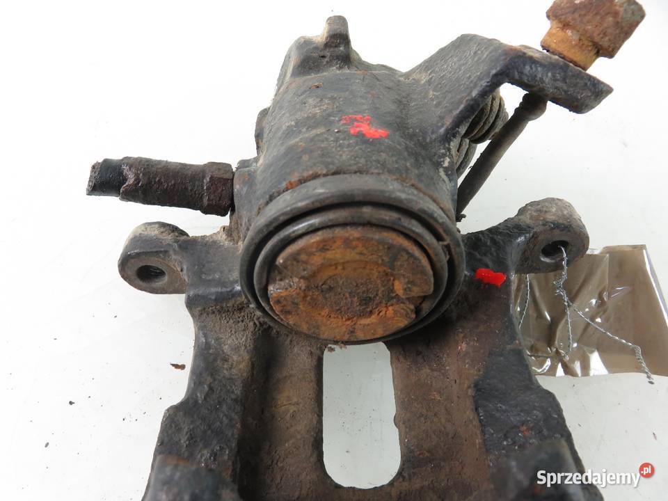 ZACISK PRAWY TYL GOLF II osobowe Części samochodowe