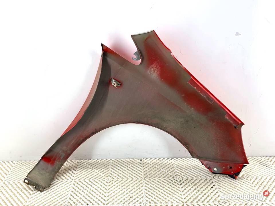 BŁOTNIK LEWY PRZÓD OPEL CORSA D Hatchback 0614