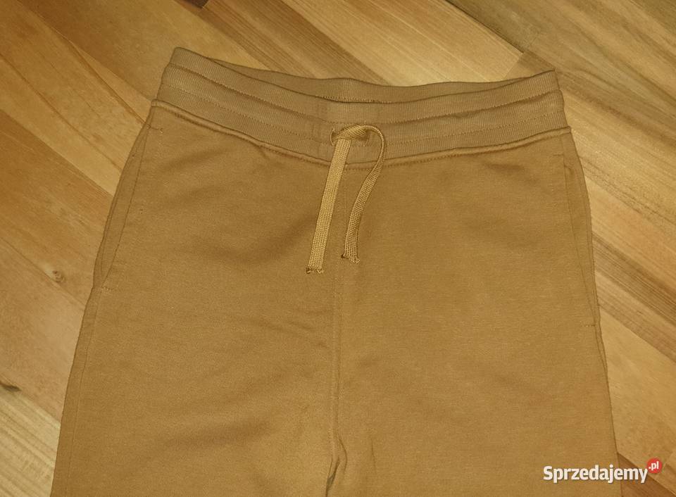 HM musztardowe spodnie dresowe joggery