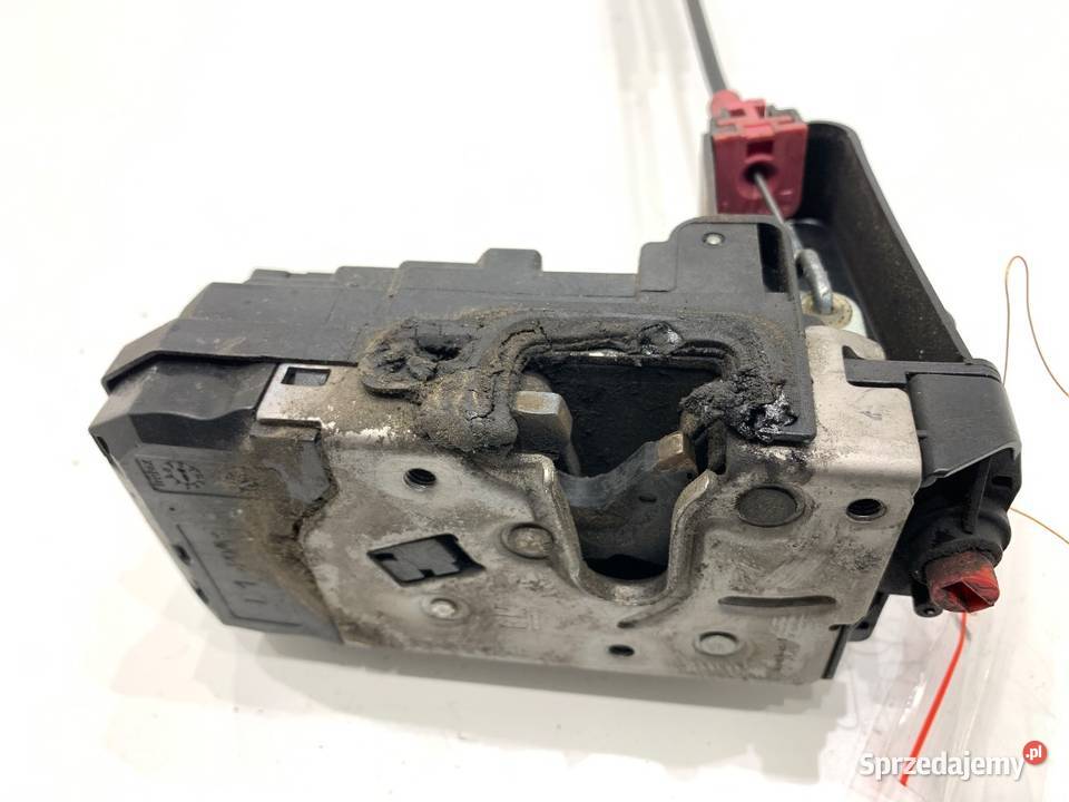 ZAMEK DRZWI LEWY TYŁ OPEL ASTRA H Kombi 13210738