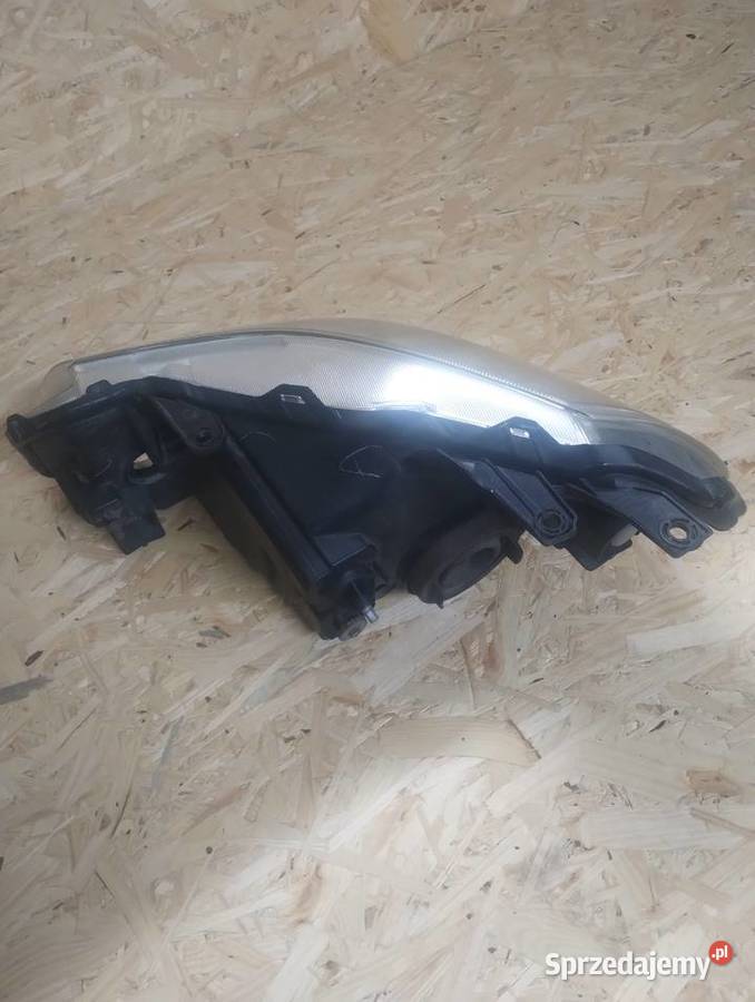 Lampy przód Suzuki SX4 oryginał Jodłownik