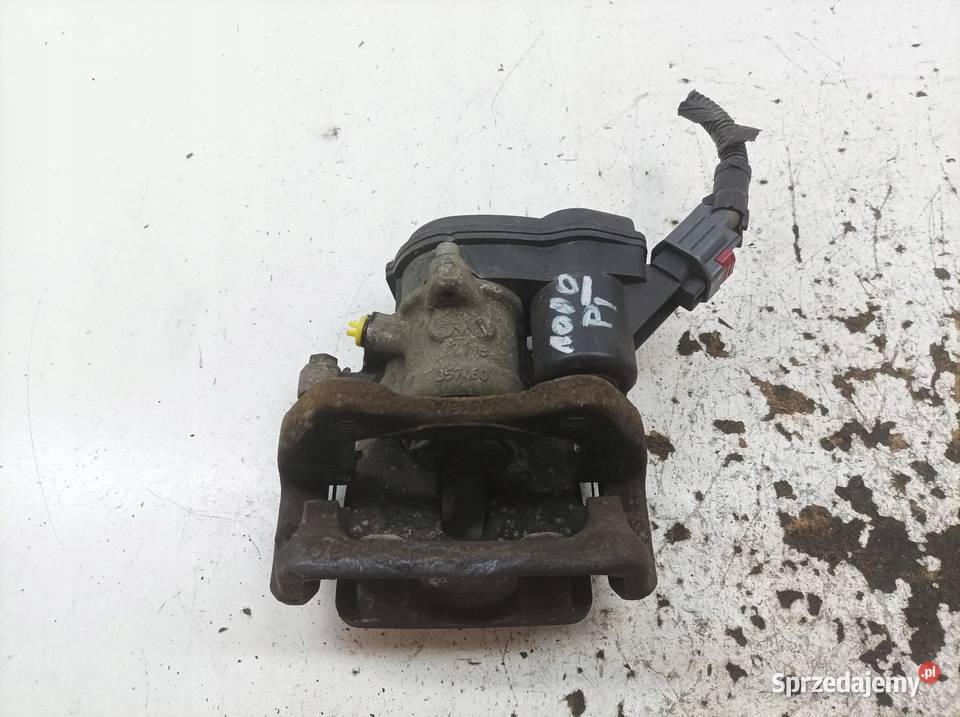 ZACISK HAMULCOWY PRAWY TYŁ 17 DCI 440008660R sprzedam