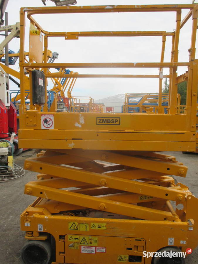 Podnośnik nożycowy zwyżka 65 m Genie GS1532 Dźwigi, podnośniki