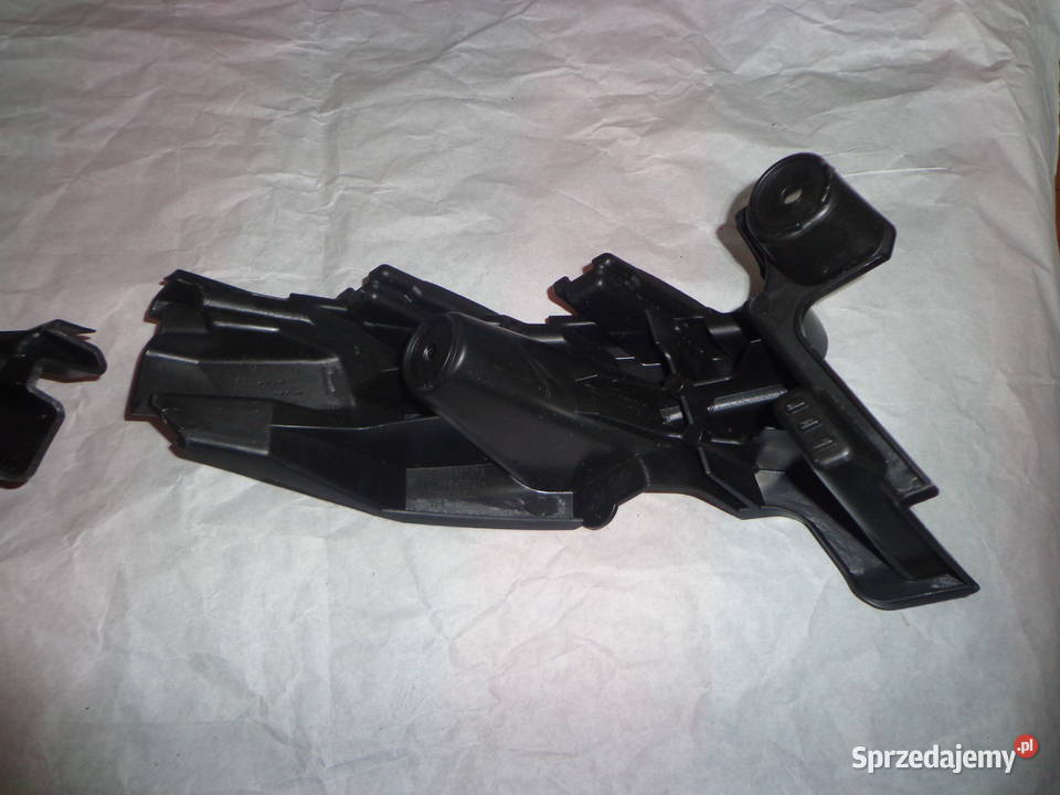 Skoda Karoq ślizg mocowanie zderzaka tył lewy