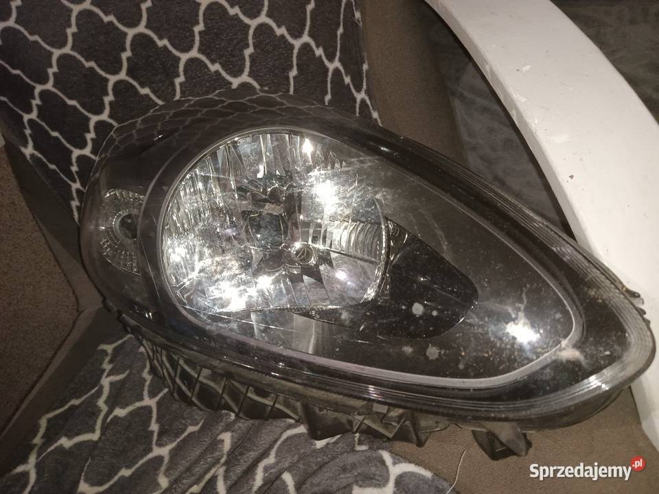 OkazjaLAMPA PRAWA REFLEKTOR FIAT GRANDE PUNTO kupiony w Polsce Pawonków
