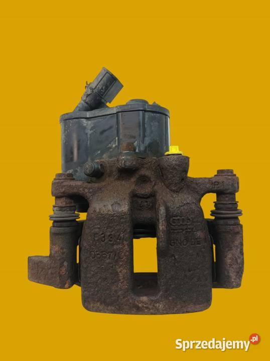 ZACISK HAMULCOWY LEWY TYŁ 32 FSI ELEKTRYCZNY Rok produkcji 2006