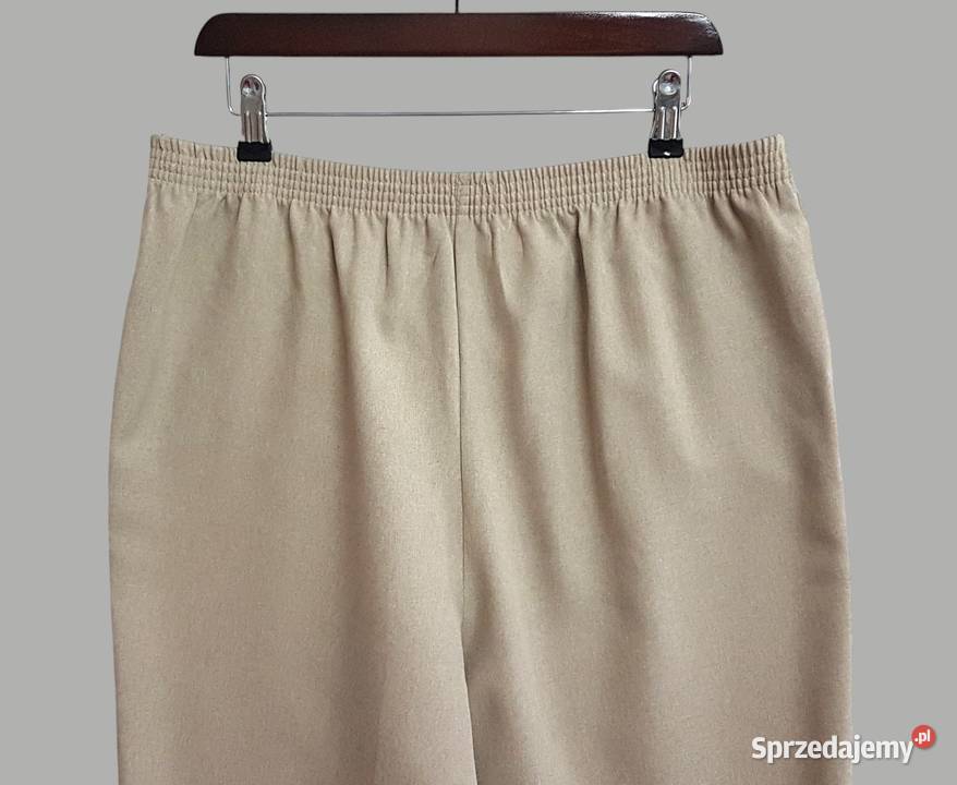 Damskie eleganckie beżowe spodnie materiałowe Chrzanów