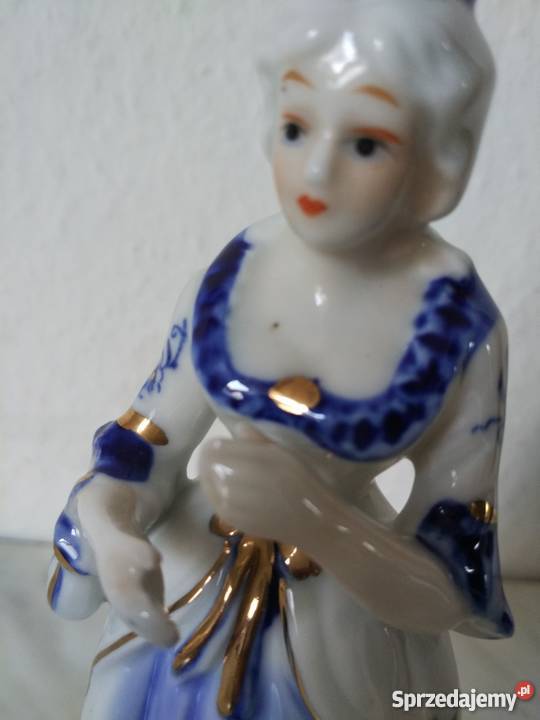Figurka z porcelanydama z brawami Ropa