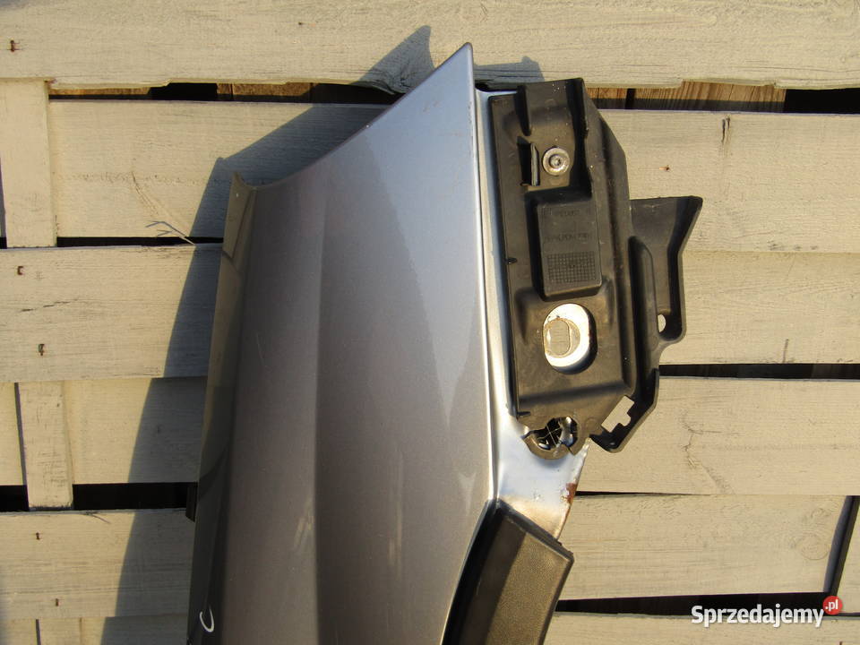 BŁOTNIK PRZEDNI PRAWY OPEL CORSA C Z163 SREBRNY Mysłaków