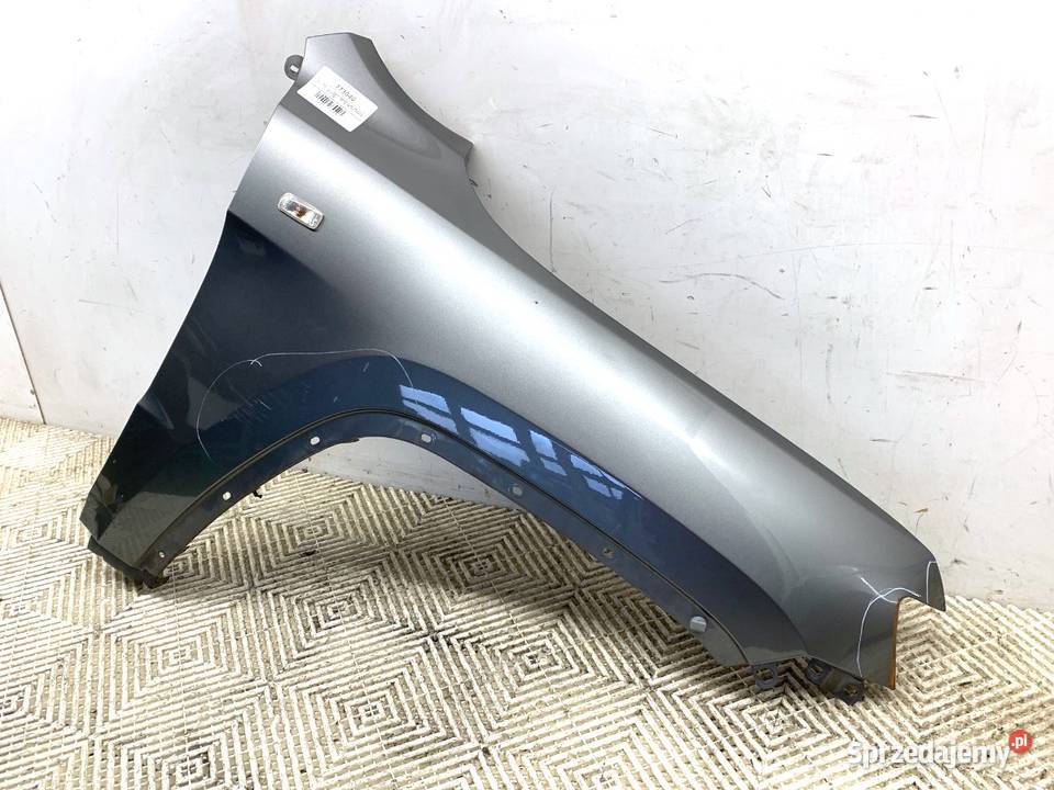 BŁOTNIK PRAWY PRZÓD JEEP GRAND CHEROKEE WK osobowe