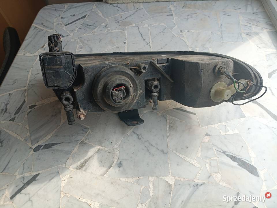 lampa chrysler grand voyager 1997 lewy przód mazowieckie Szydłowiec