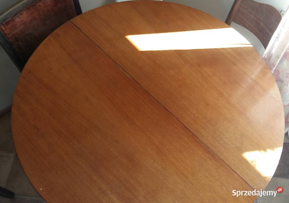 Stół drewniany fornirowany okrągły rozkładany.