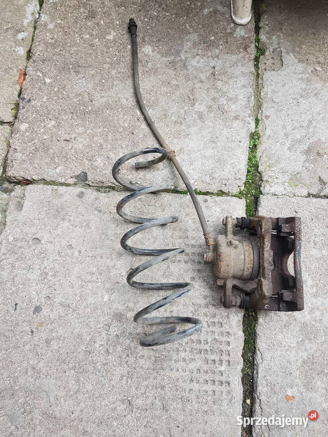 NISSAN NOTE E12 E 12 zacisk hamolcow praw przod