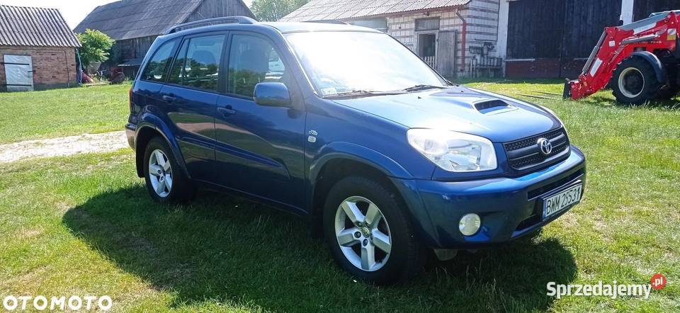 Toyota RAV4 niebieski metalik stan Malinowo