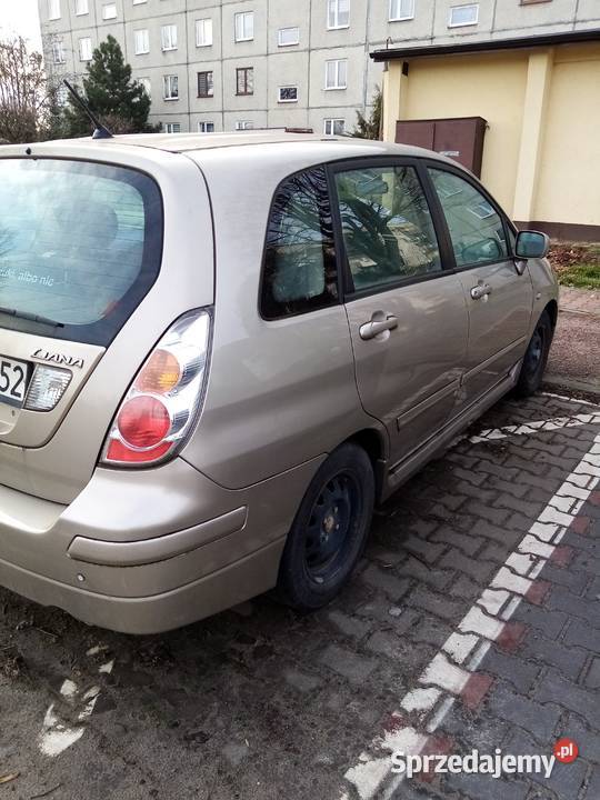 Suzuki Liana chatchback beżowy metal 16 Benzyna sprzedam