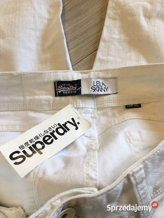 Białe jeansy damskie Superdry 2630 Skawina sprzedam