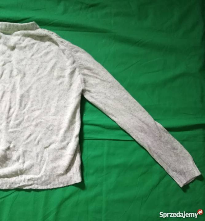 Wygodny lekki jasnozielony sweterek Moda i Styl