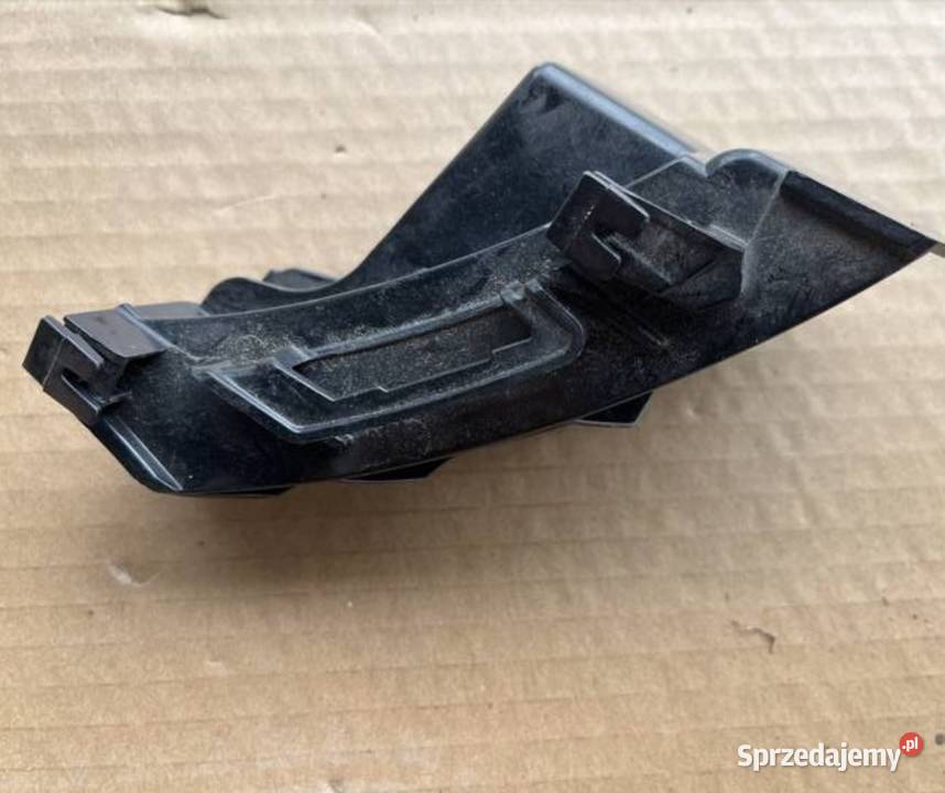 COROLLA E21 ŚLIZG ZDERZAKA LEWY TYŁ 5215602140 osobowe Międzychód