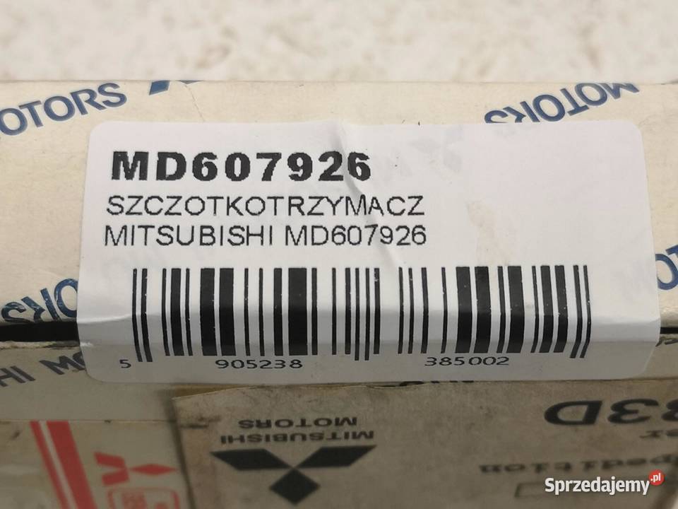 SZCZOTKOTRZYMACZ ROZRUSZNIKA MITSUBISHI L400