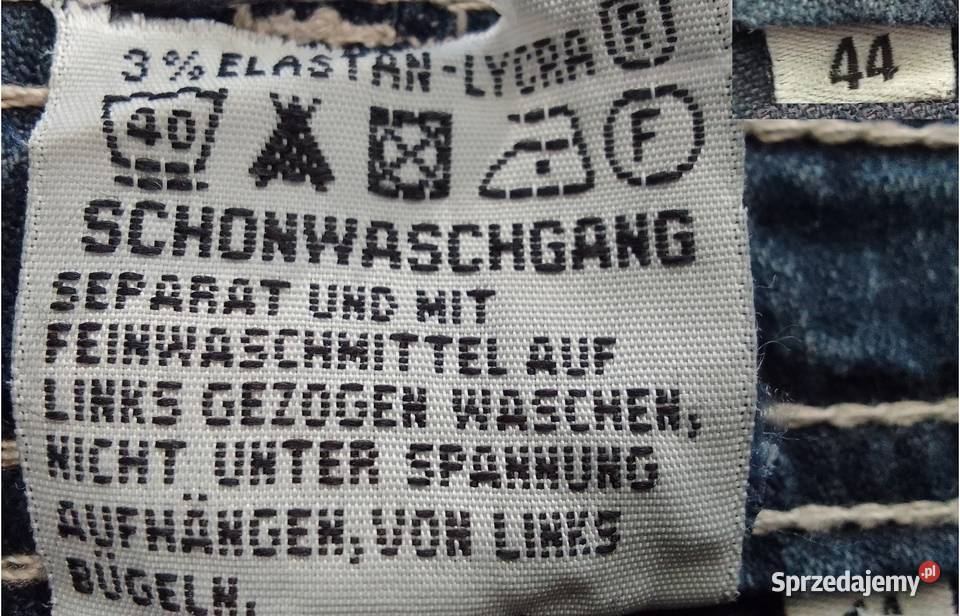 Spodnie damskie jeansowe 44 z elastanem w pasie Rewal