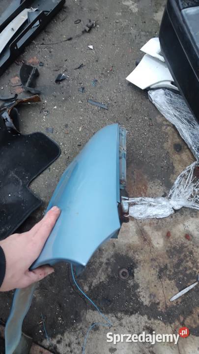 Błotnik lewy Fiat Seicento jasnoniebieski osobowe wielkopolskie Książ Wielkopolski