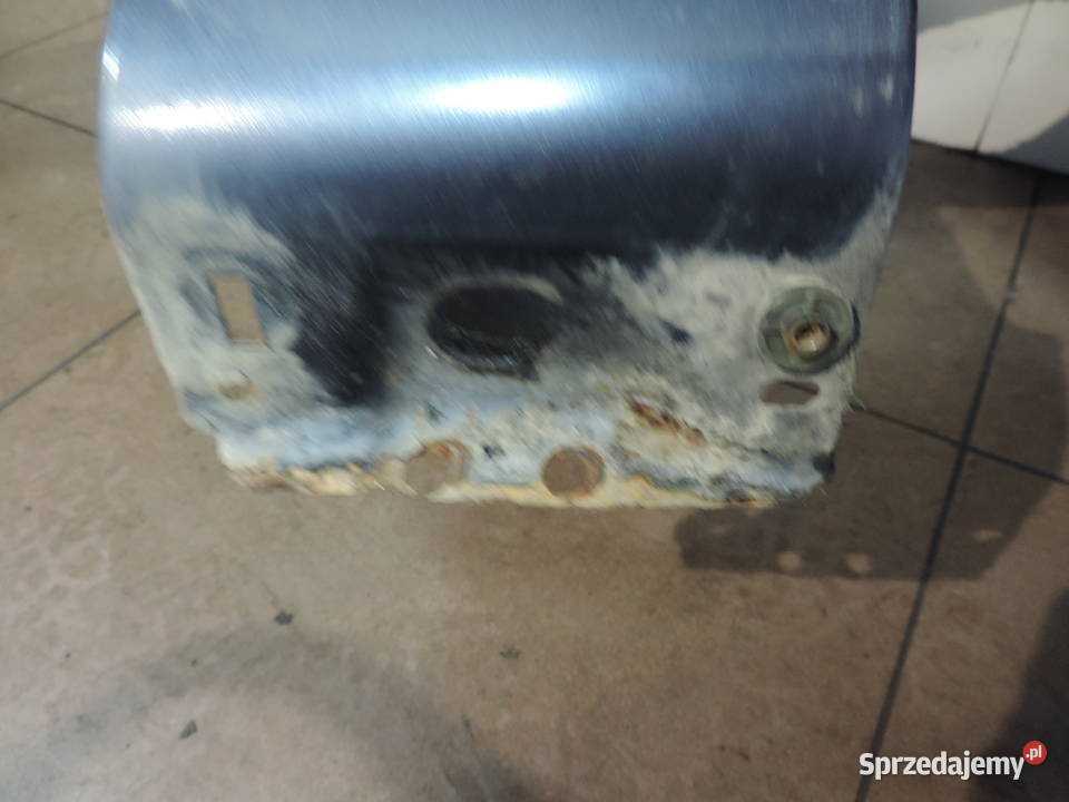 BŁOTNIK LEWY PRZOD FORD FOCUS MK2 LIFT KOLOR H4