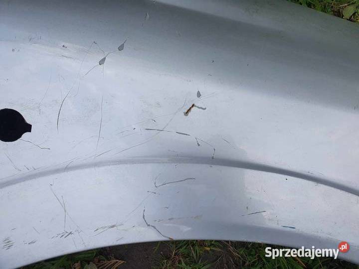 Błotnik prawy srebrny opel Astra G 9809 z osobowe Kraków
