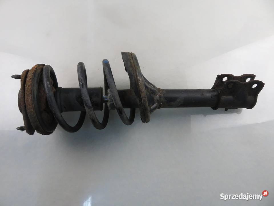 MCPERSON LEWY PRZEDNI MITSUBISHI OUTLANDER I 24