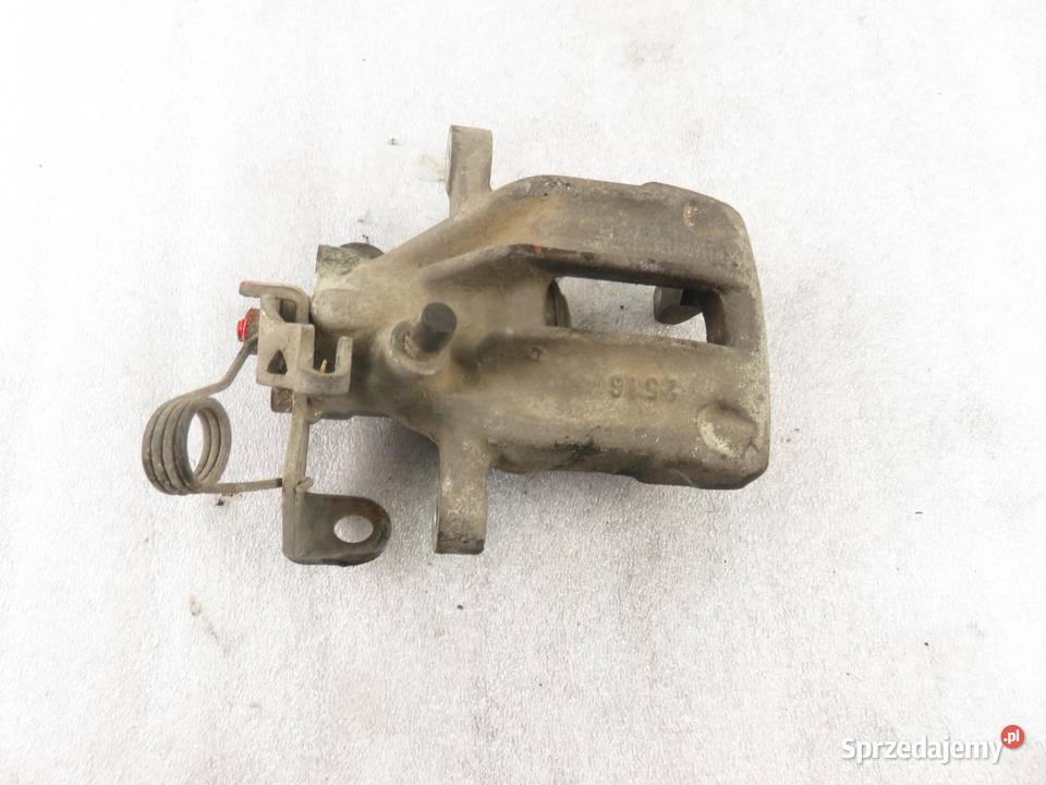 ZACISK LEWY TYŁ AUDI A6 C4 25 TDI Zaciski i jarzma