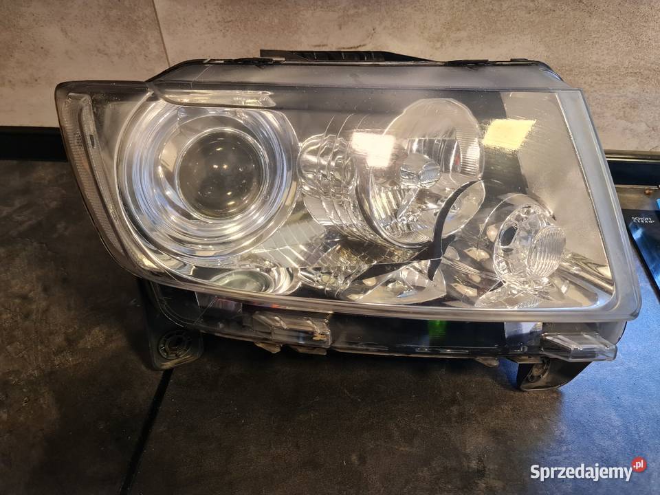 Jeep Grand Cherokee lampa Lewy przód 55079408AG lewe Ustroń
