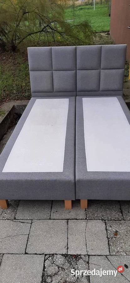 Łóżko kontynentalne z tapicerowanym zagłówkiem Łóżka Poznań sprzedam