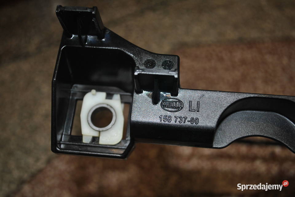 Ślizg lampy lewy przód BMW E60 E61 Poręba sprzedam