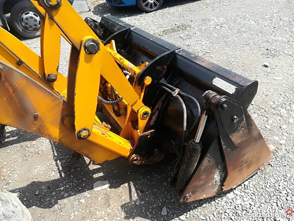 JCB 2CX koparko ladowarka mini 4 lyzki stan cat Rok produkcji 2004 Chełmiec