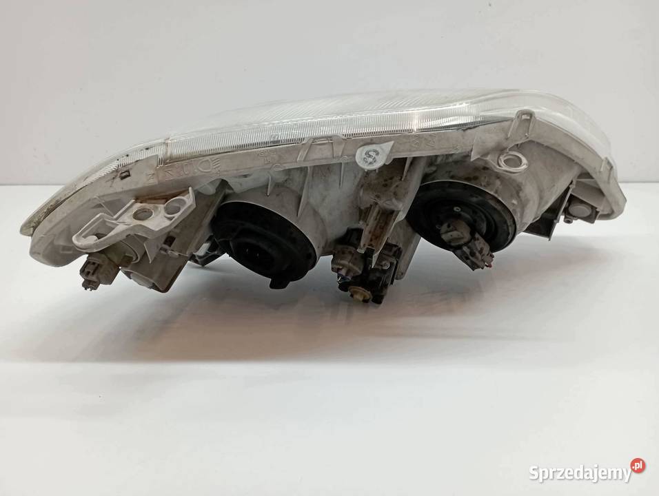 LAMPA PRZÓD LEWA KOMBI E12 Toyota Corolla IX