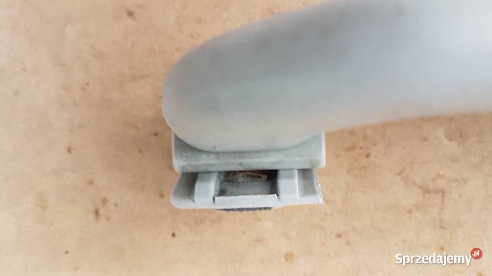 VW GOLF III UCHWYT RĄCZKA PODSUFITKI 1H0857607