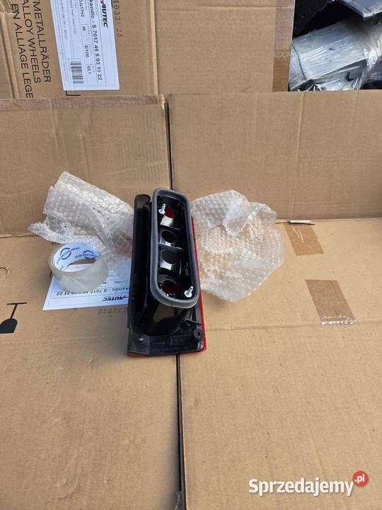 Lampa lewa lewy tył Opel Combo C 9199760 osobowe