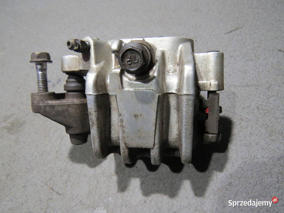 SUZUKI BURGMAN 650 05 zacisk hamulca lewy przód