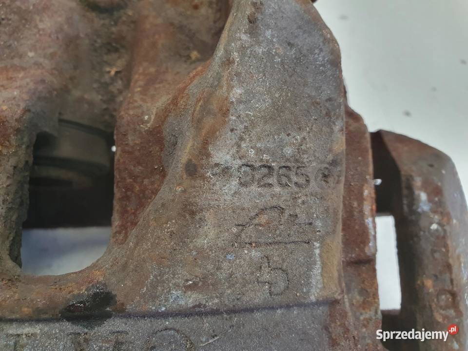 Volvo XC60 I PRZEDNI ZACISK HAMULCOWY lewy przód Chełm