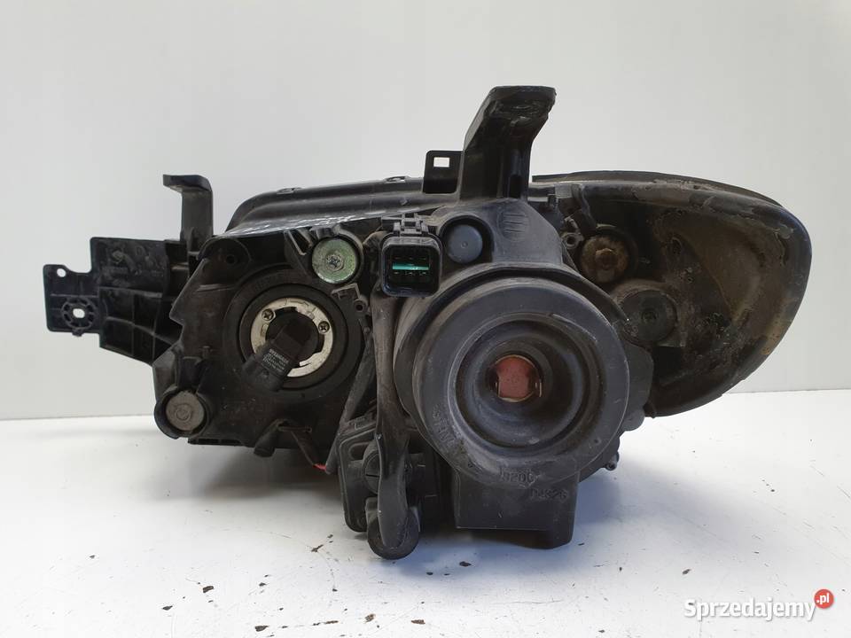 LAMPA PRAWA Mitsubishi Outlander I 0306r Rudka