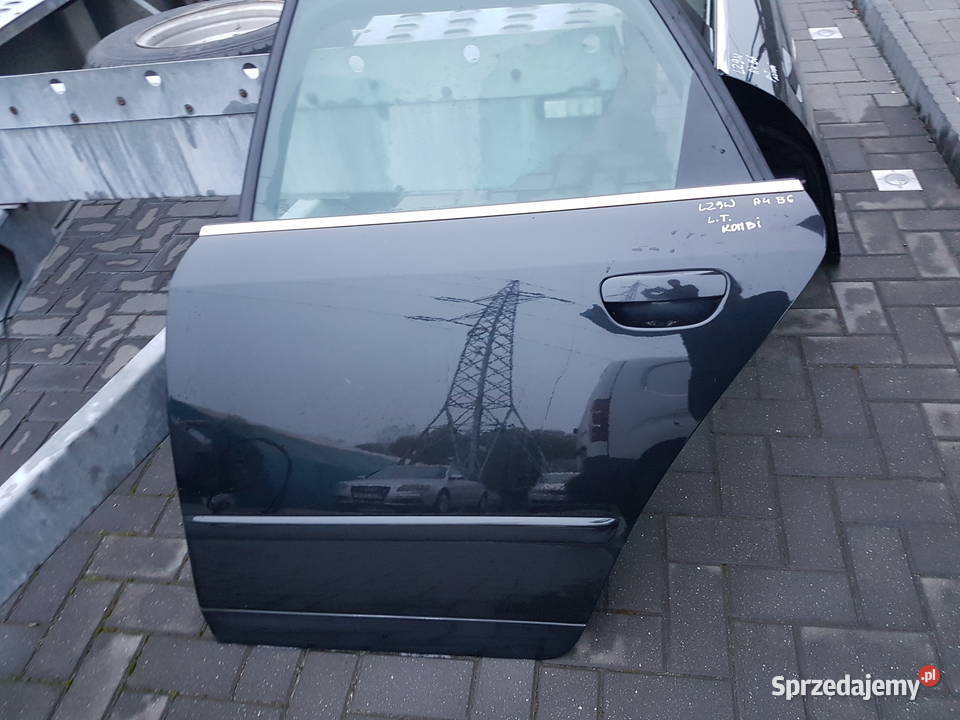 AUDI A4 B6 KOMBI DRZWI LEWE TYL CZARNE LZ9W Turek